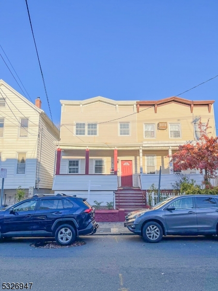 a car parked in front of a house