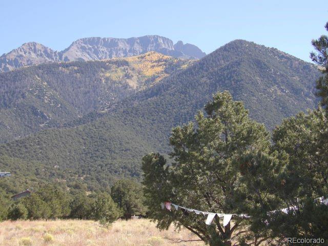 a view of a house with a mountain