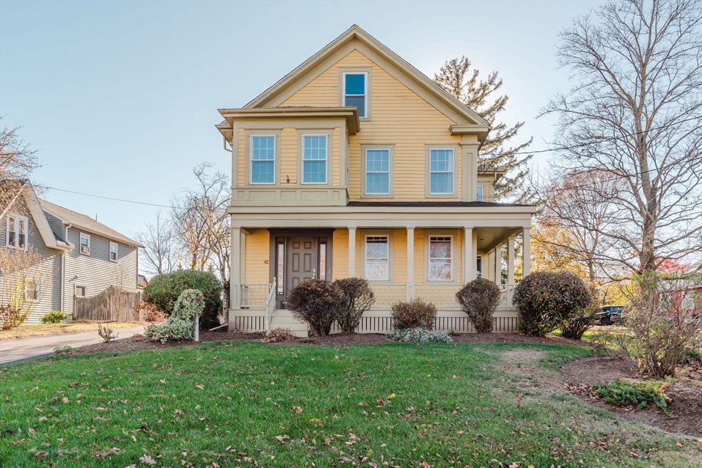 a front view of house with yard