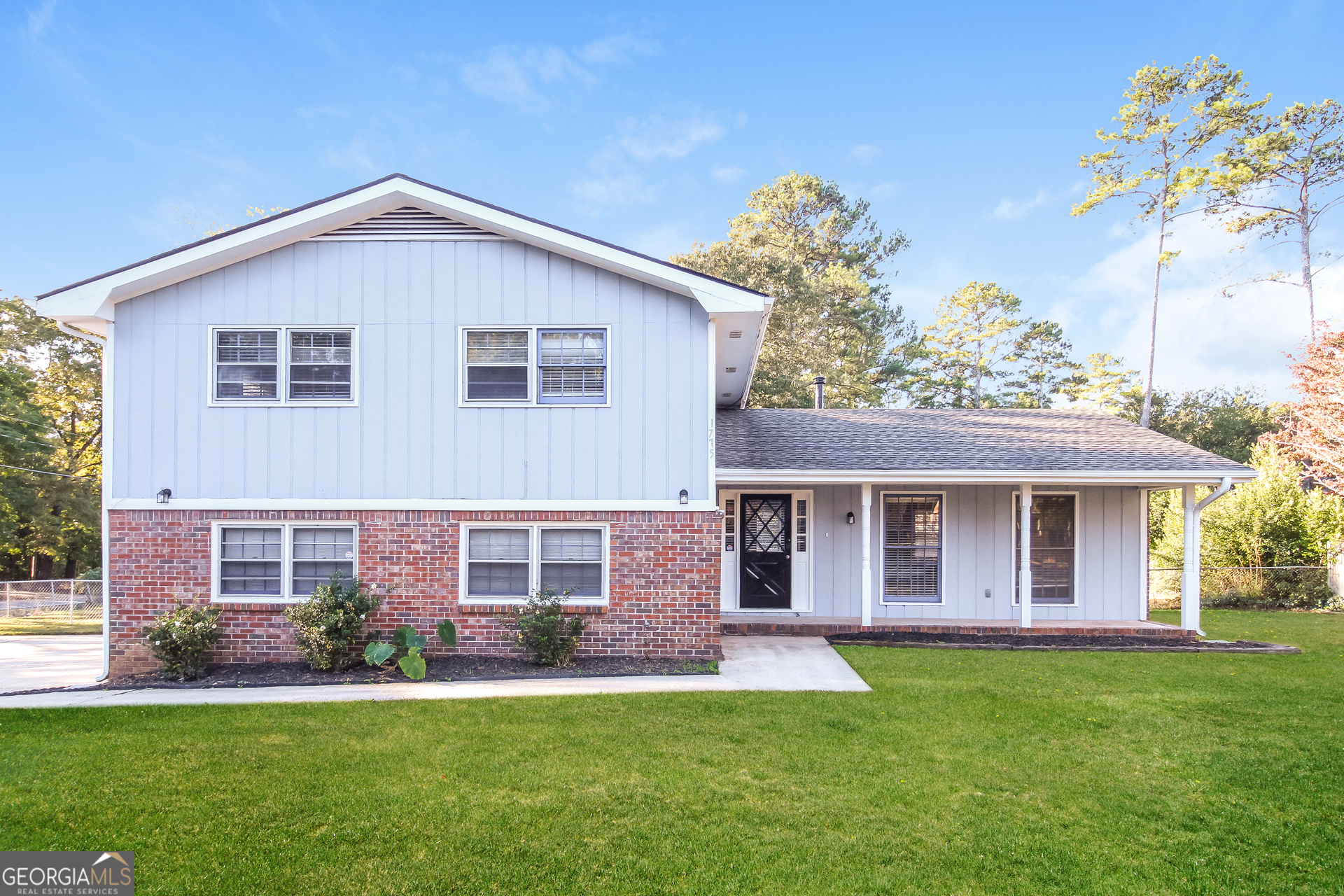 front view of a house and a yard