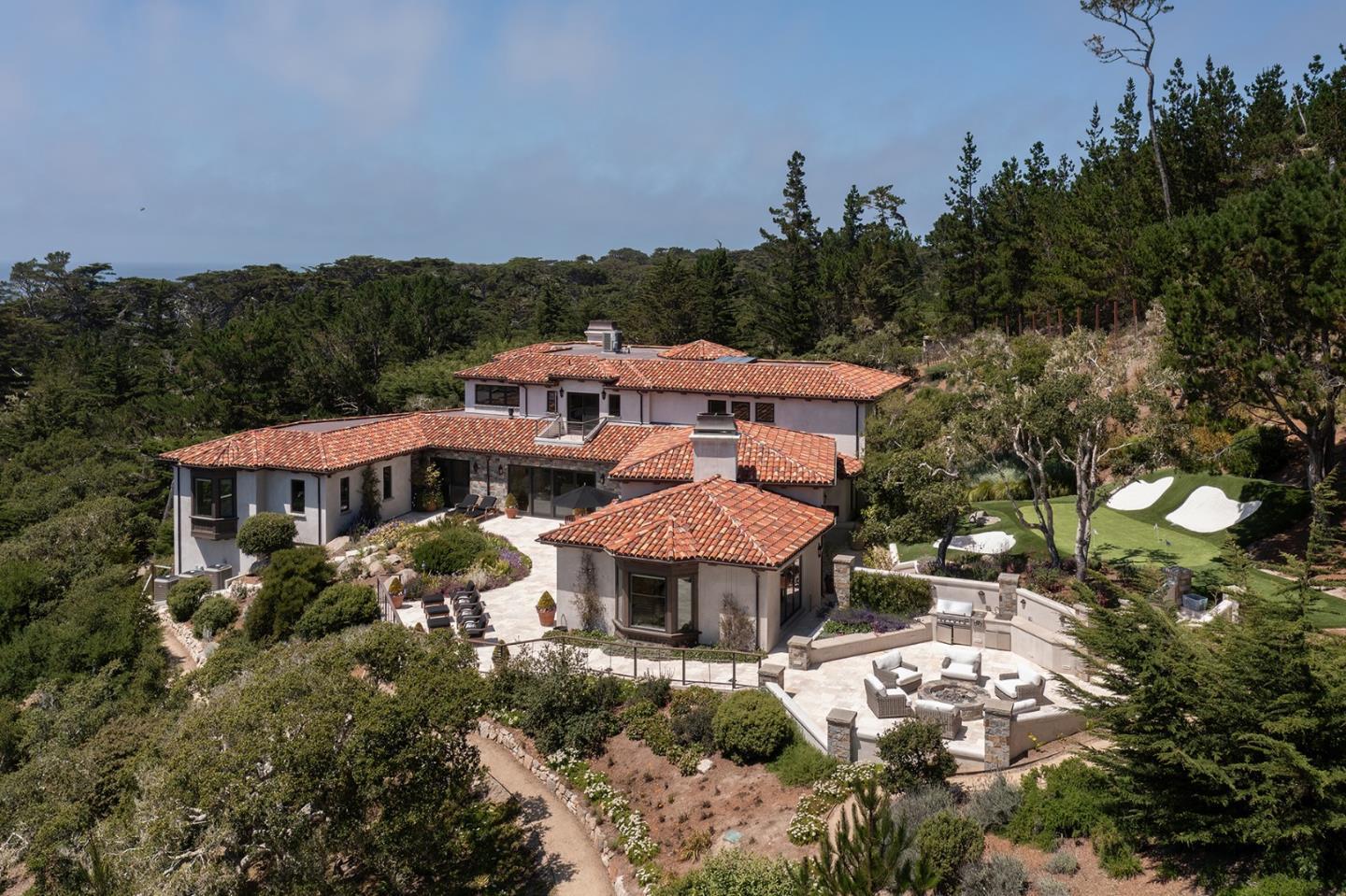 an aerial view of a house with a garden