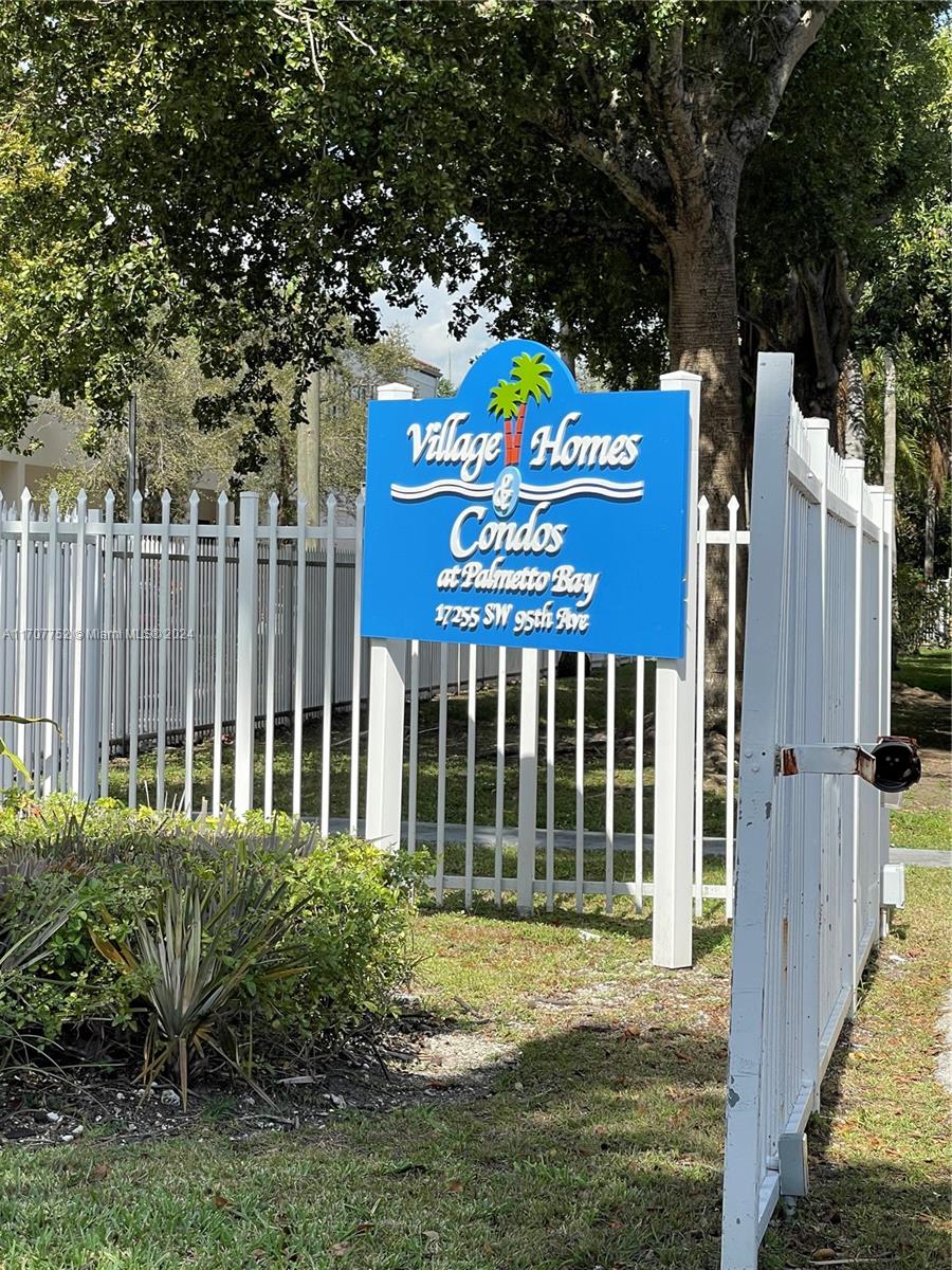 a view of a entrance gate of the house and deck