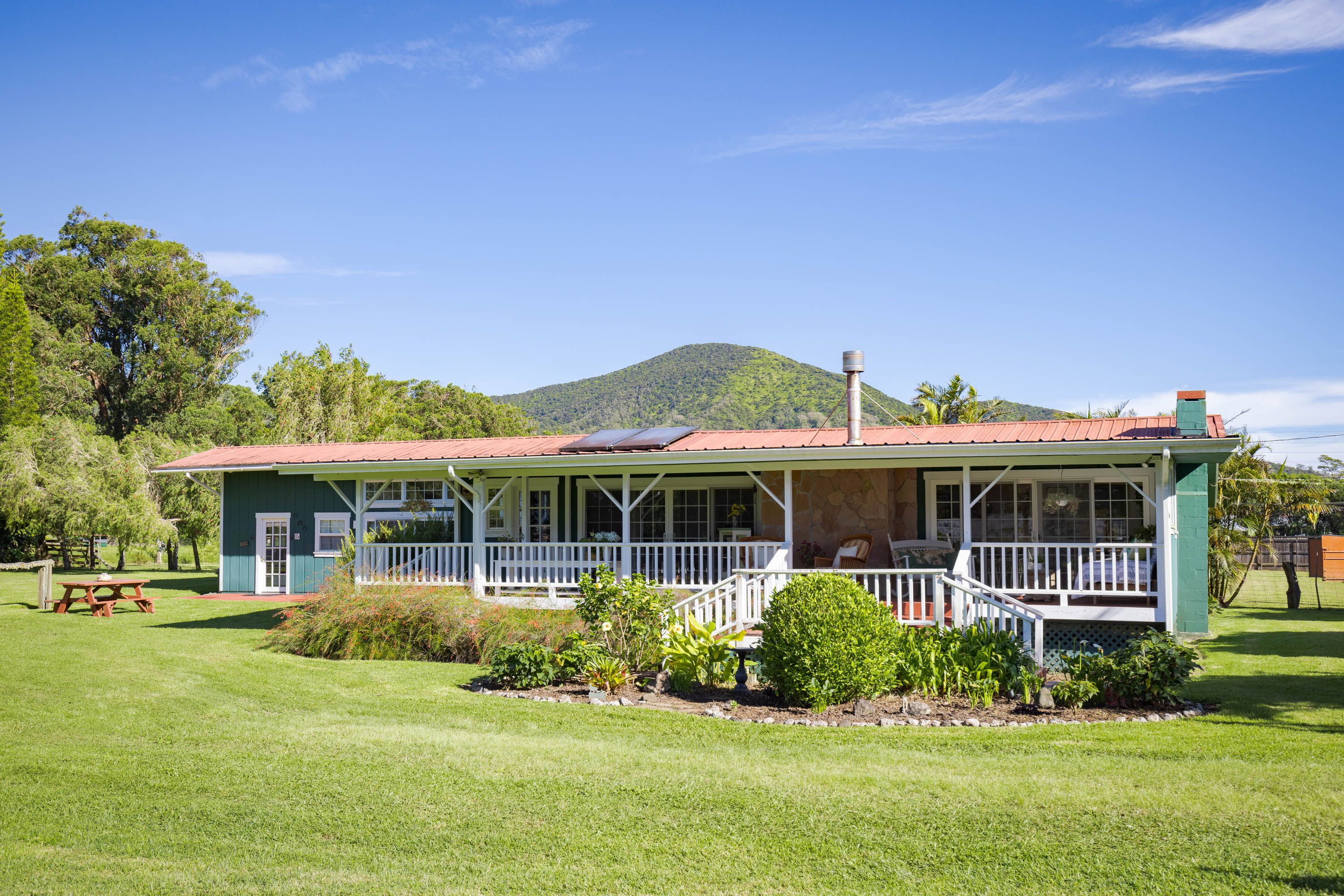 A classic Waimea Plantation home circa 1947 and remodeled and expanded in 1994 on two acres.