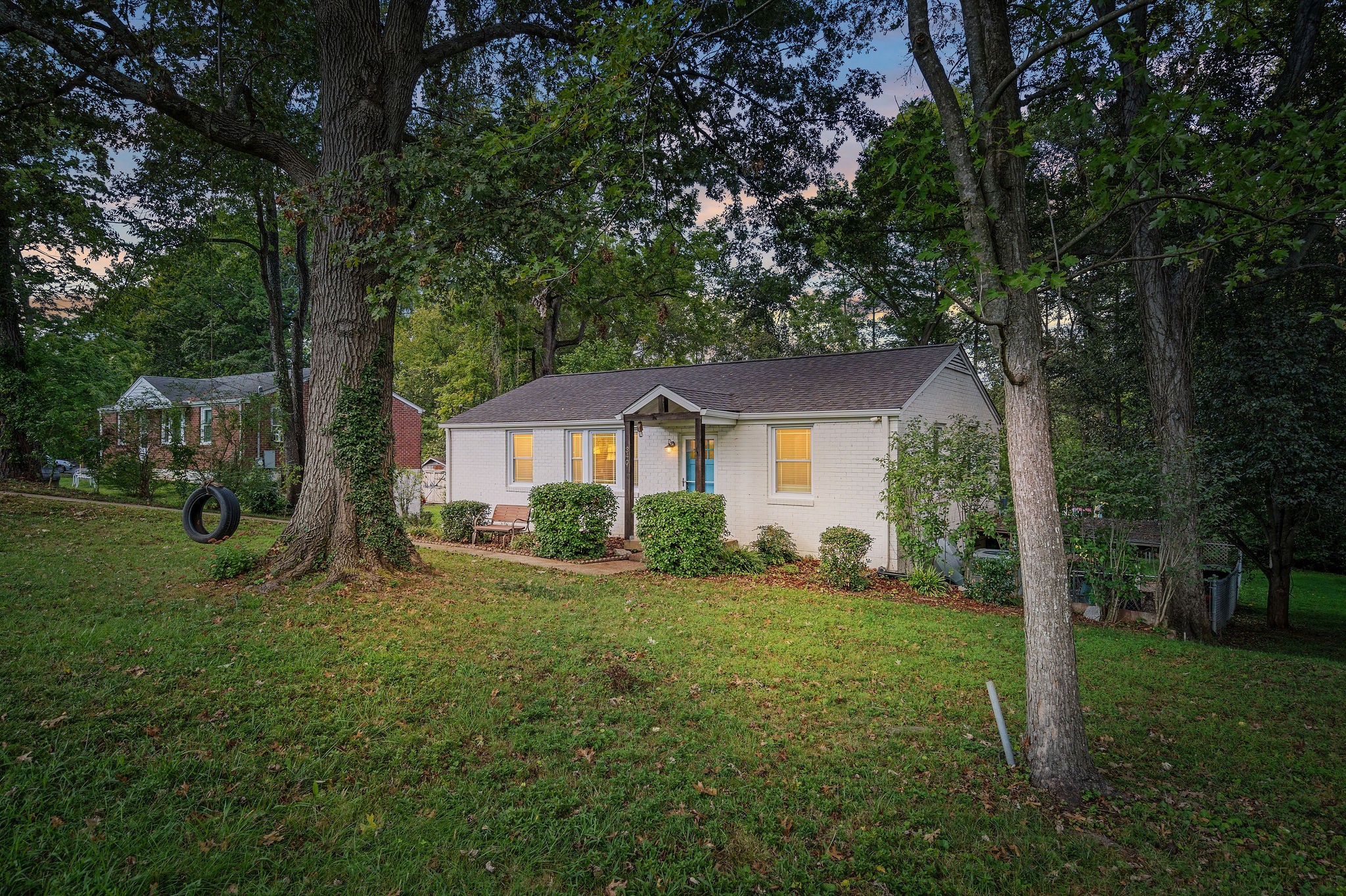 a front view of a house with a yard