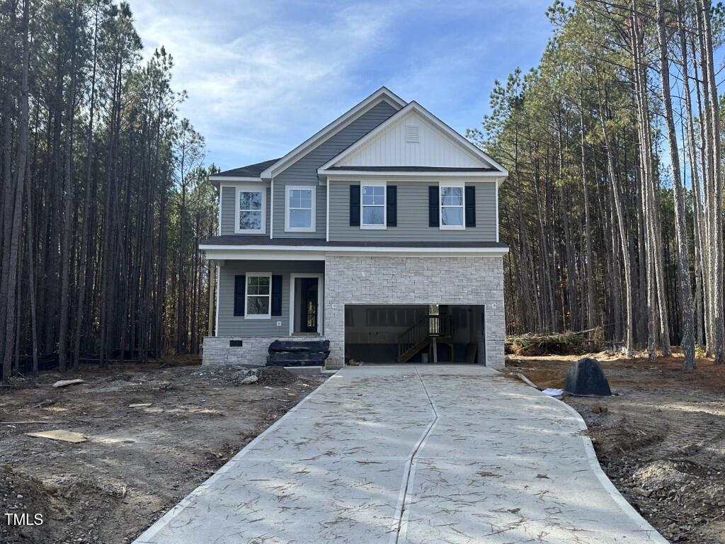 a front view of a house with yard