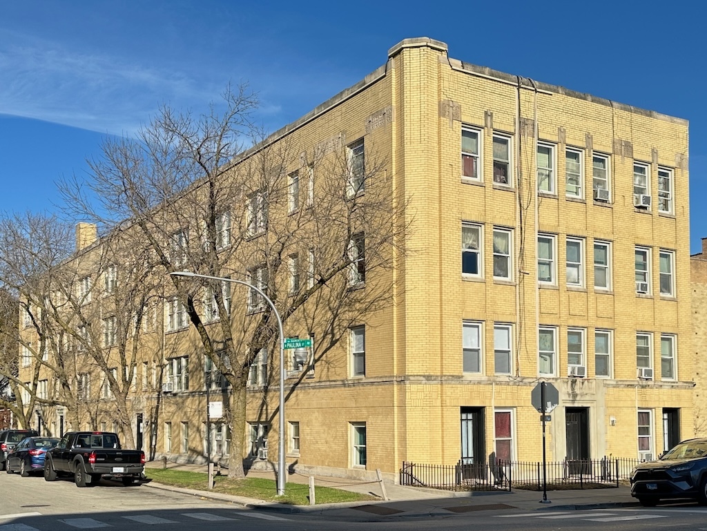 a view of a building with a street