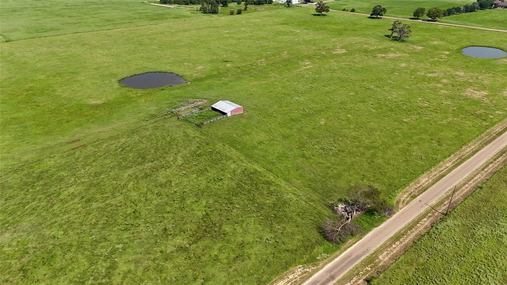 a view of a golf course with a lake