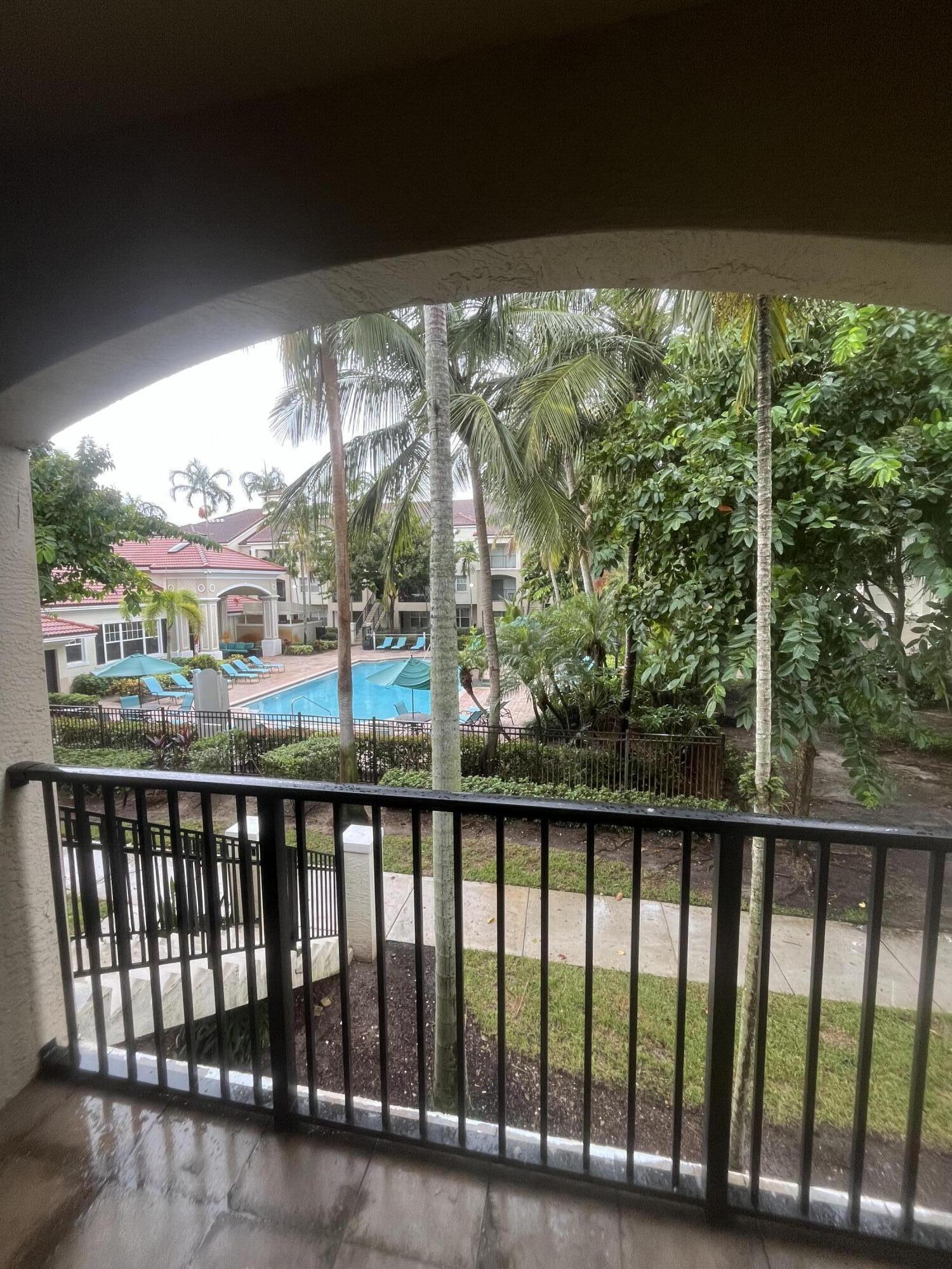 a view of a street from a balcony