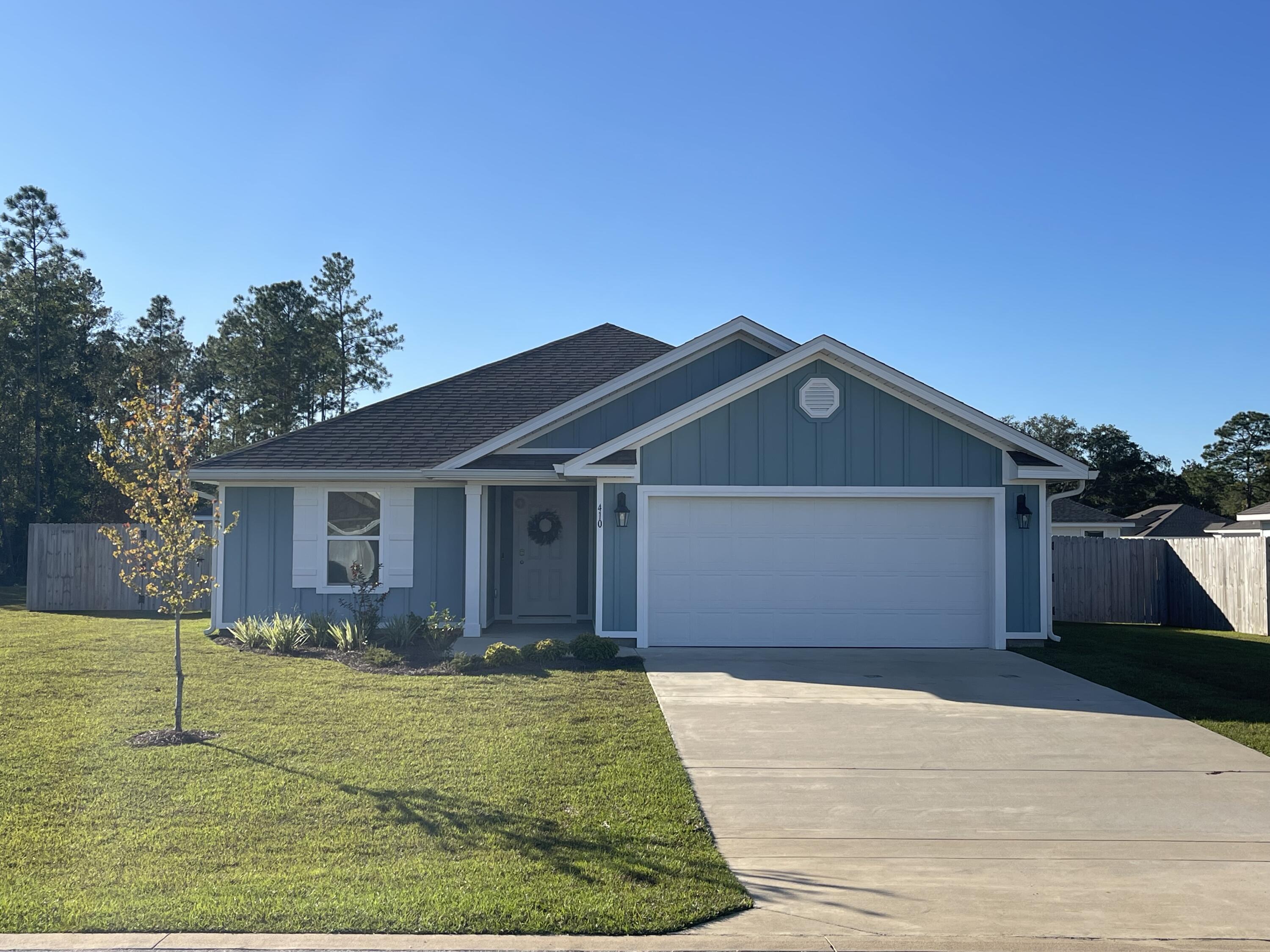 a front view of house with yard