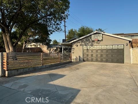 a front view of a house with a garage