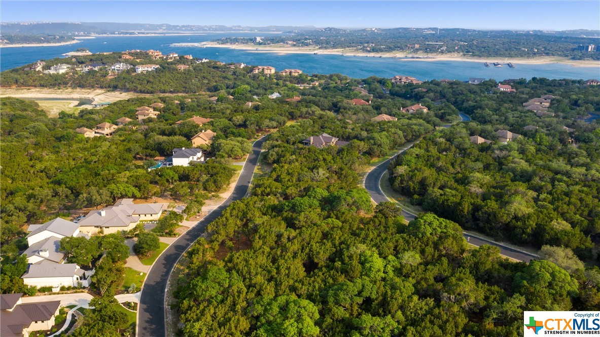 a view of a city with an ocean view