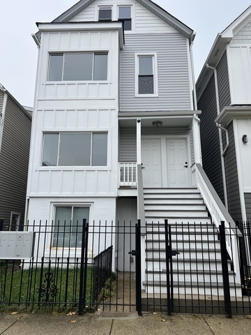 a building with a window and balcony