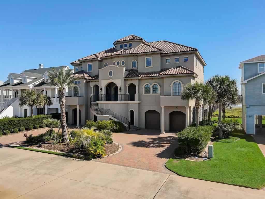 Welcome to 19615 Shores Drive. This exquisite Mediterranean Villa has stunning views of both the Bay and the Gulf and features direct access to the beach via private walkover.