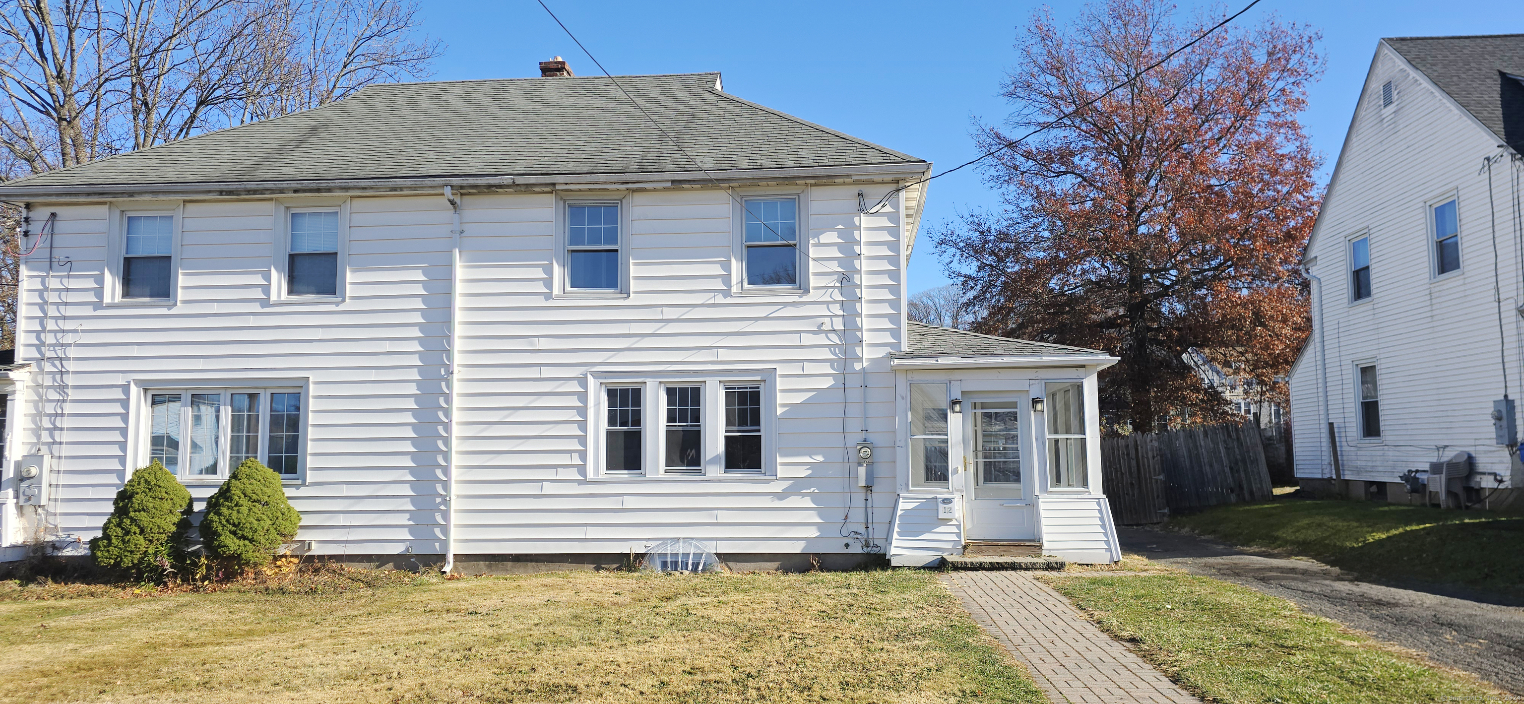 a front view of house with yard