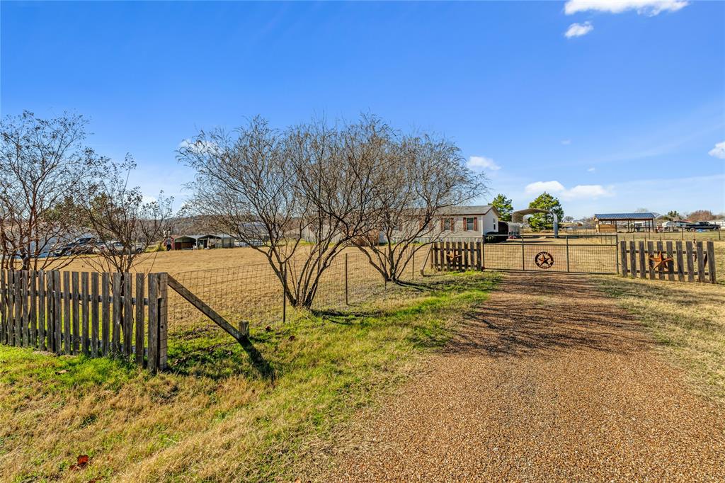 a view of houses with yard