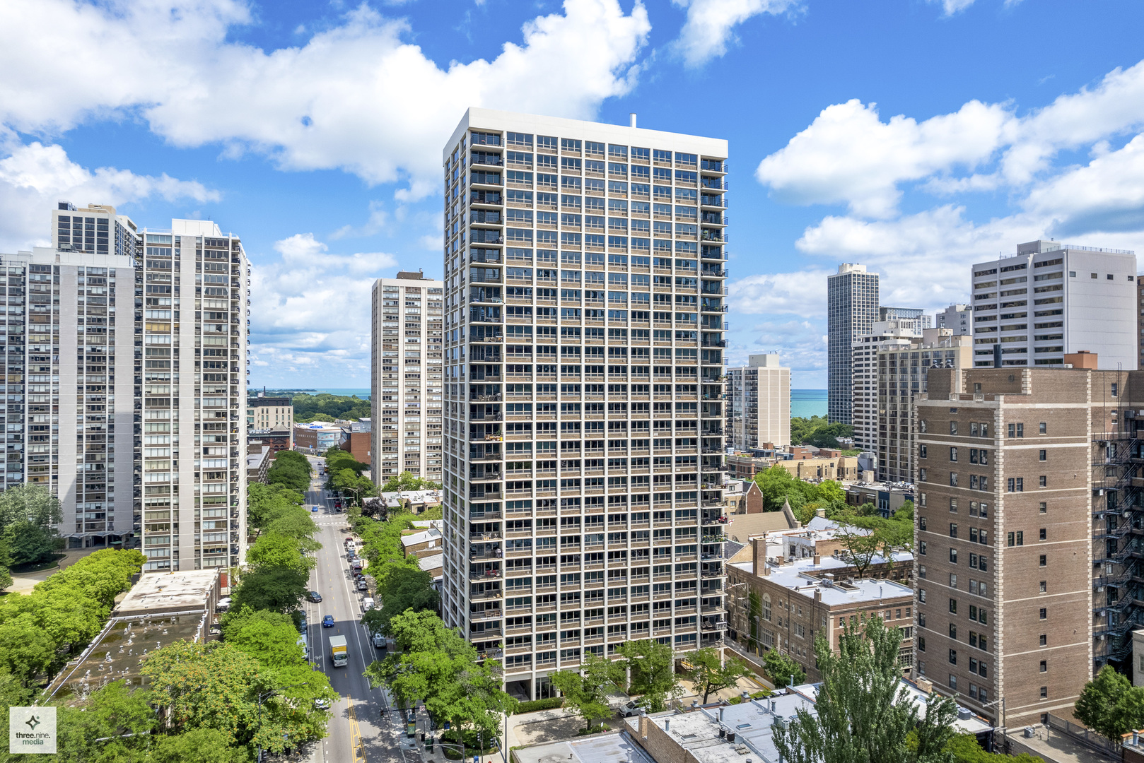 a view of a city with tall buildings