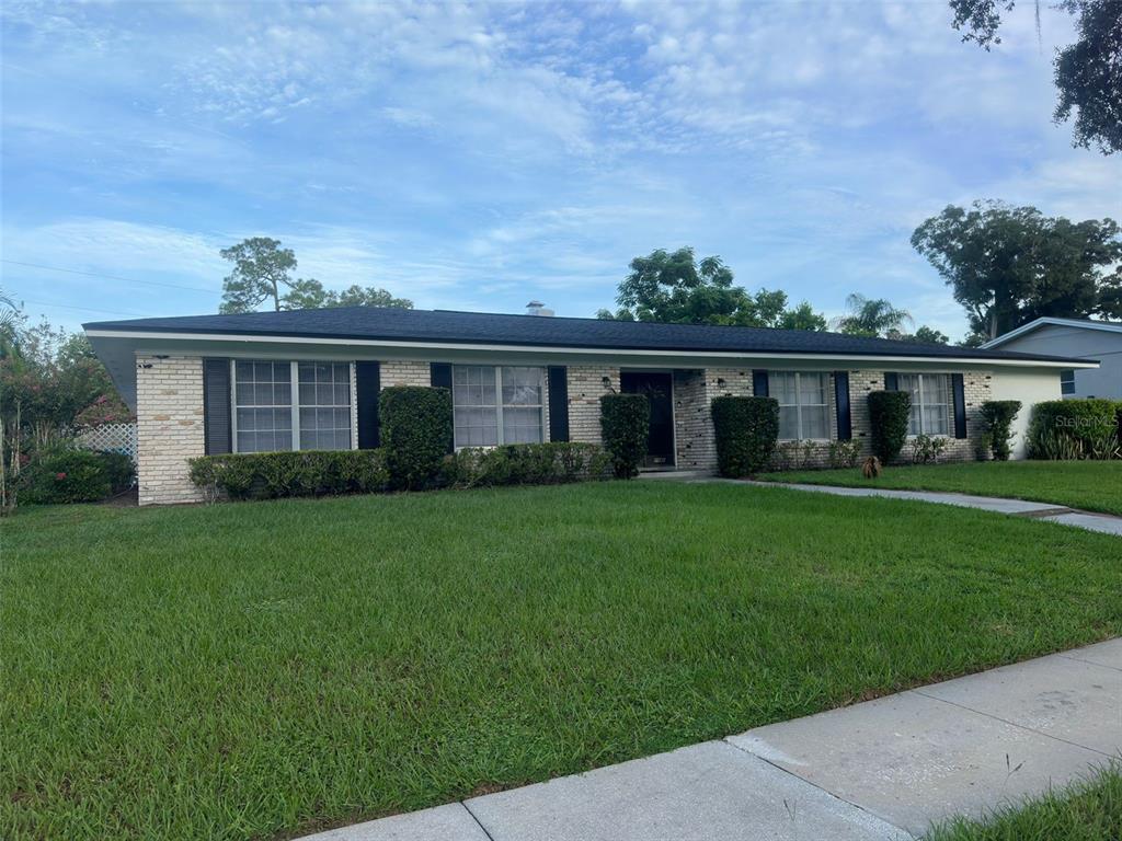 front view of a house and a yard