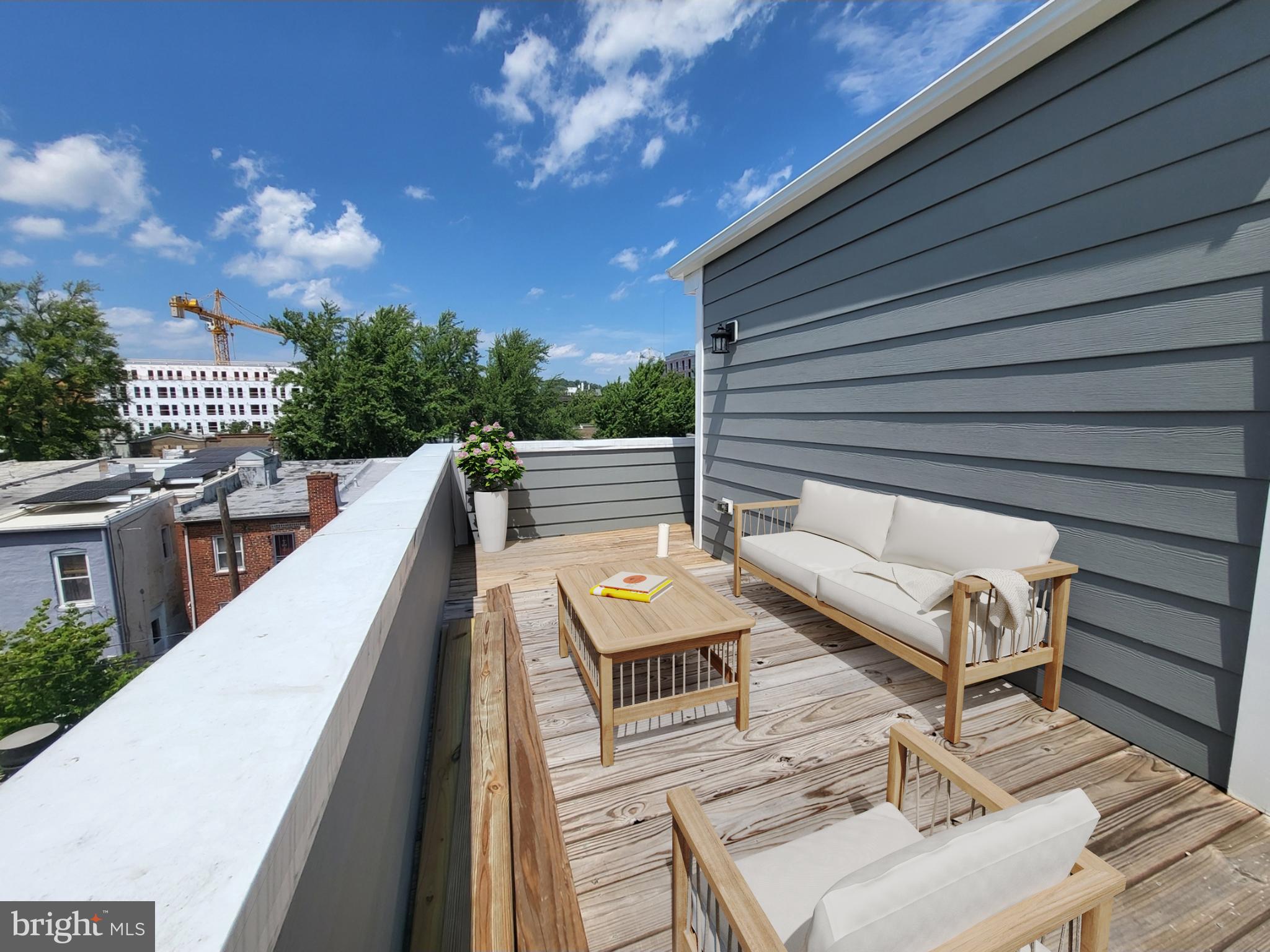 a view of a terrace with furniture