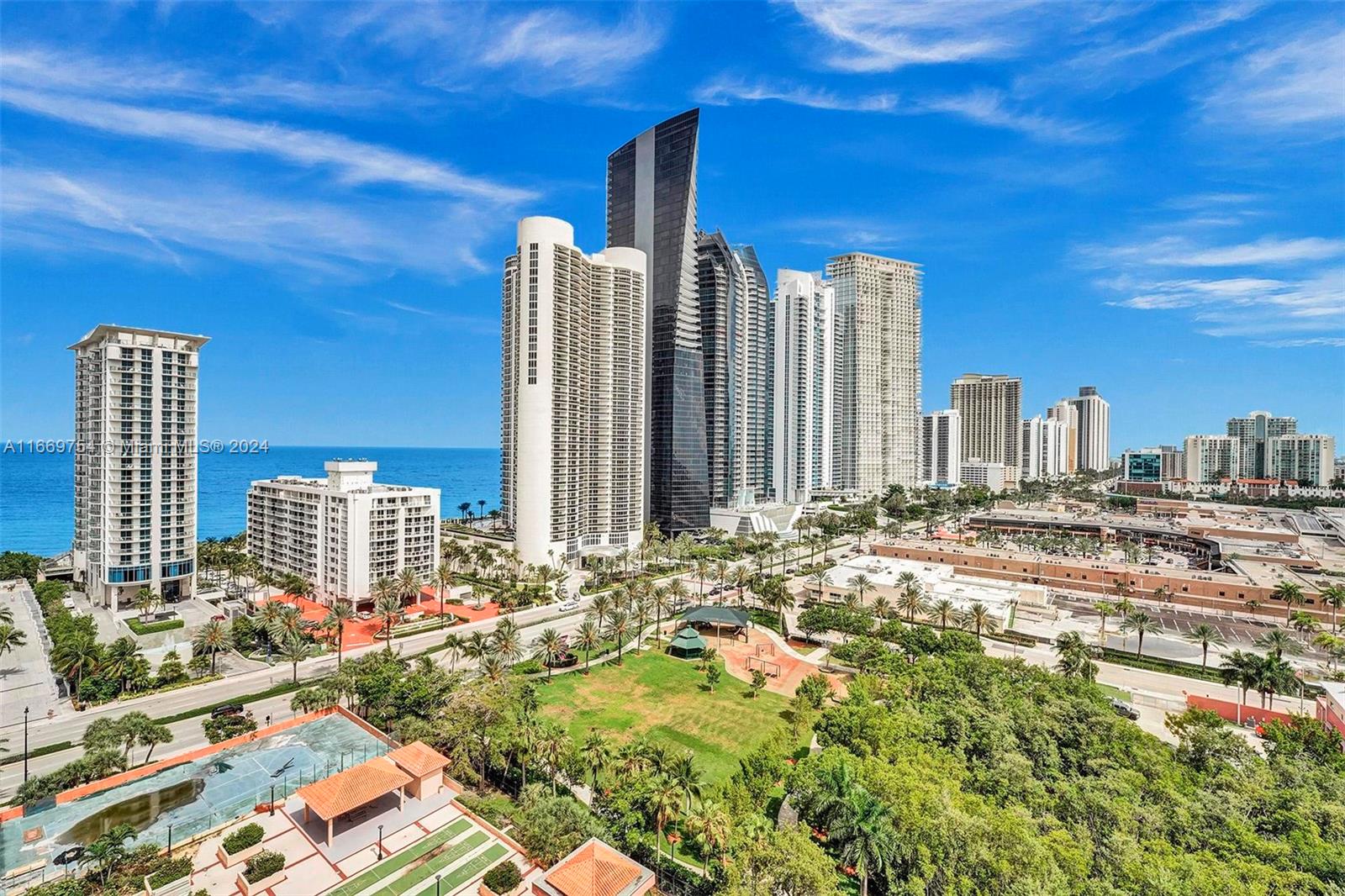 a view of a city with tall buildings