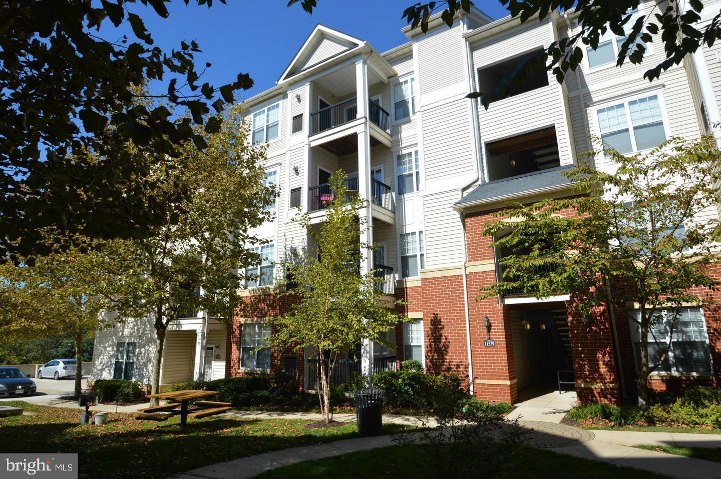 front view of a building with a yard