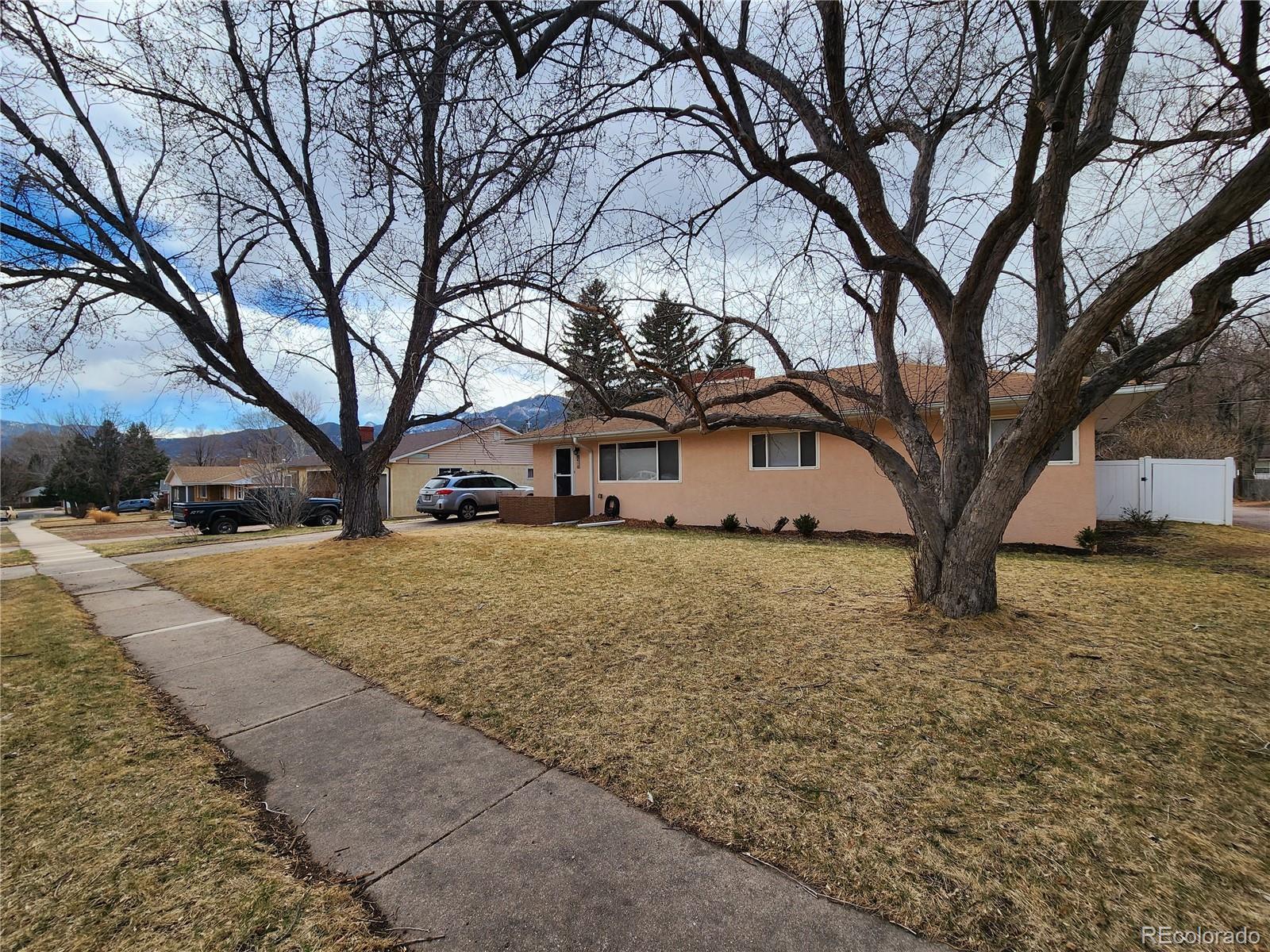 a view of a house with a snow in the yard