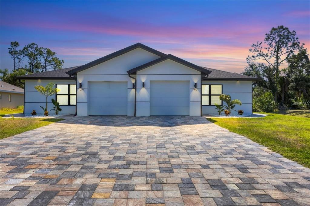 a view of house with yard and outdoor space