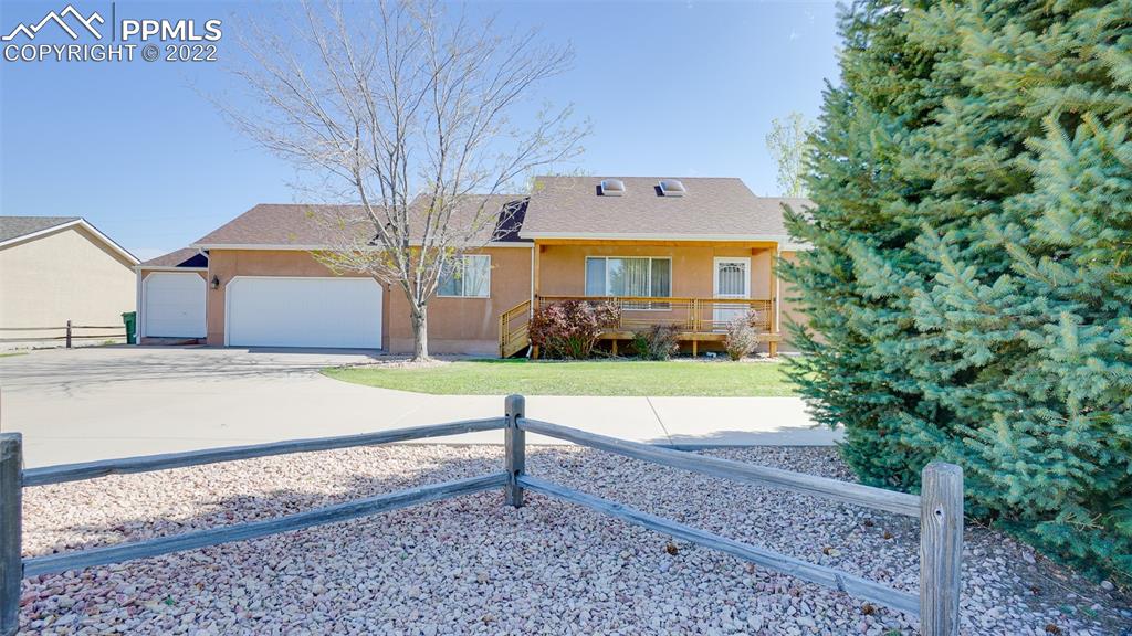 a house with trees in front of it