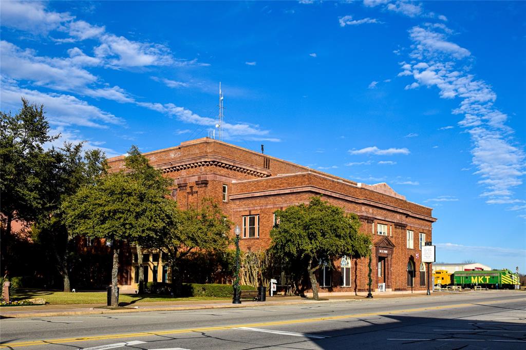 a view of a building and a street