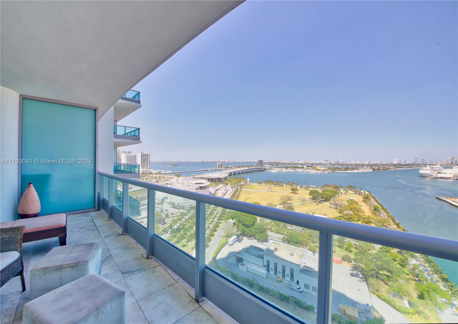 a view of a balcony with furniture