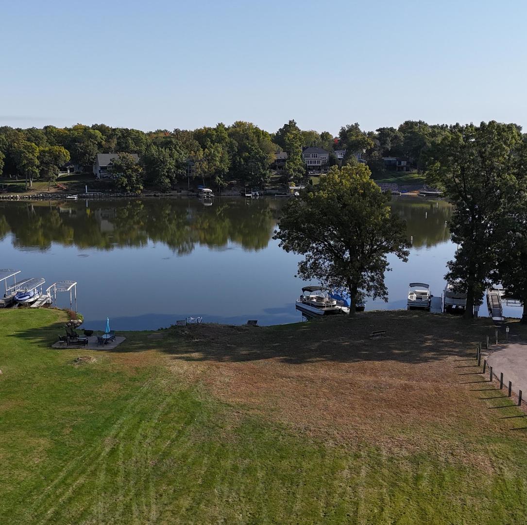 a view of a lake in front of a building