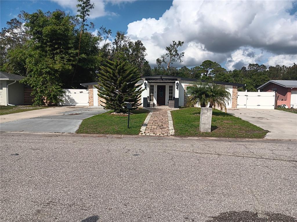 a front view of house with yard