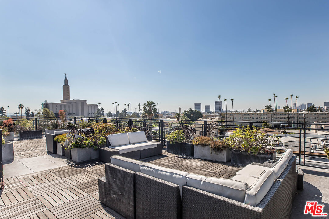 a view of a terrace with furniture