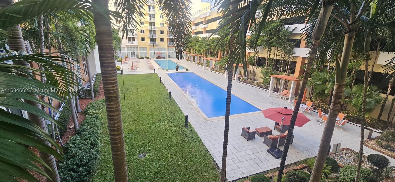 a view of yard from deck having patio