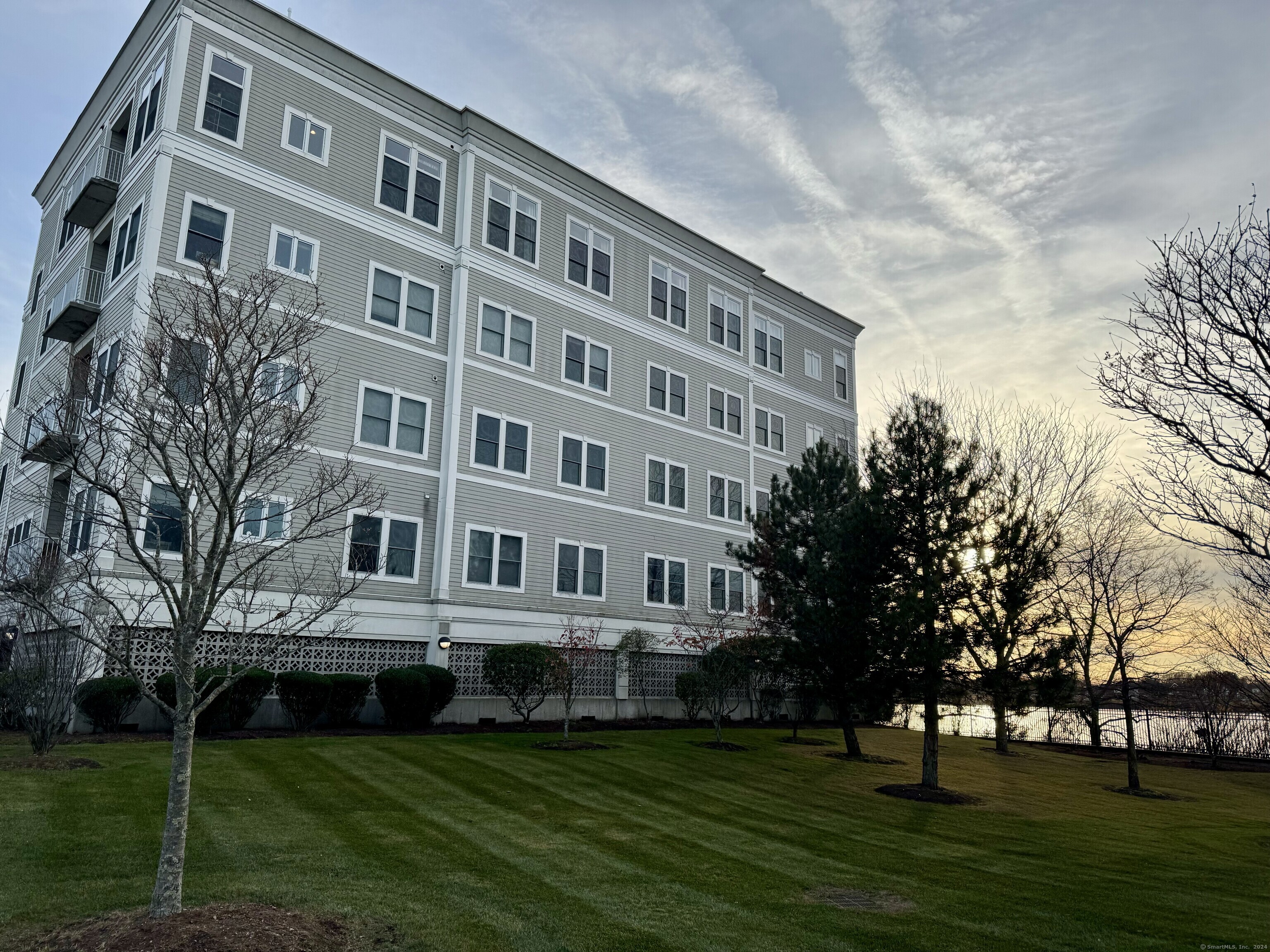 a view of building with yard