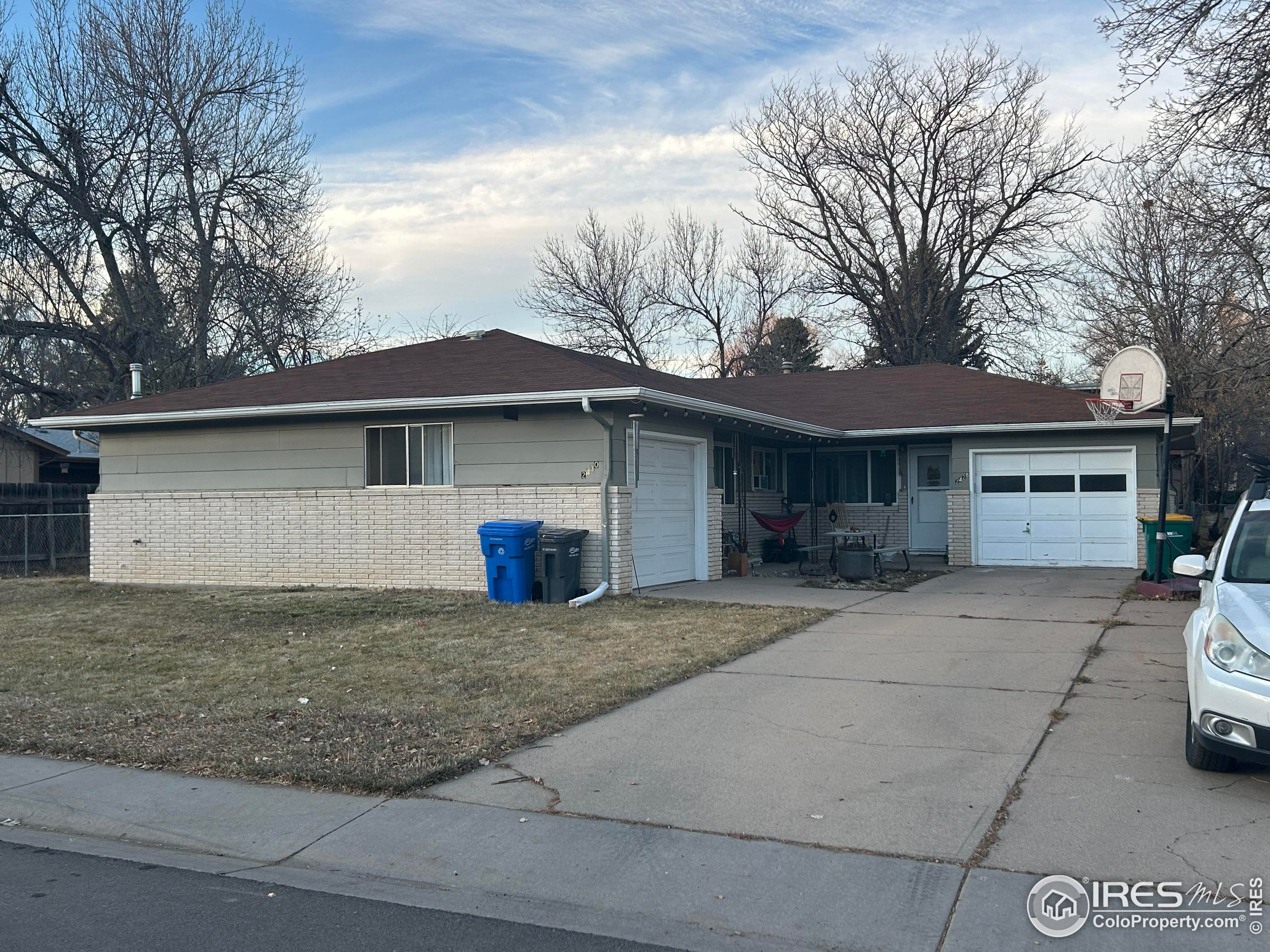 a front view of a house with garage