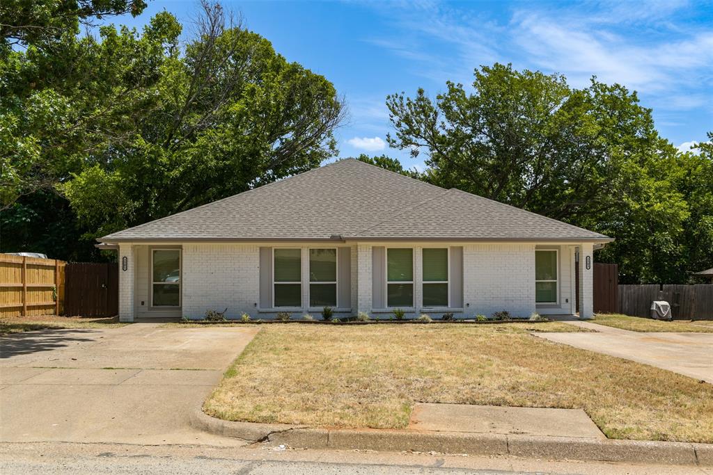 a house with trees in the background