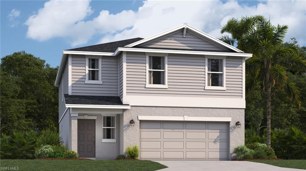 a front view of a house with garage and trees