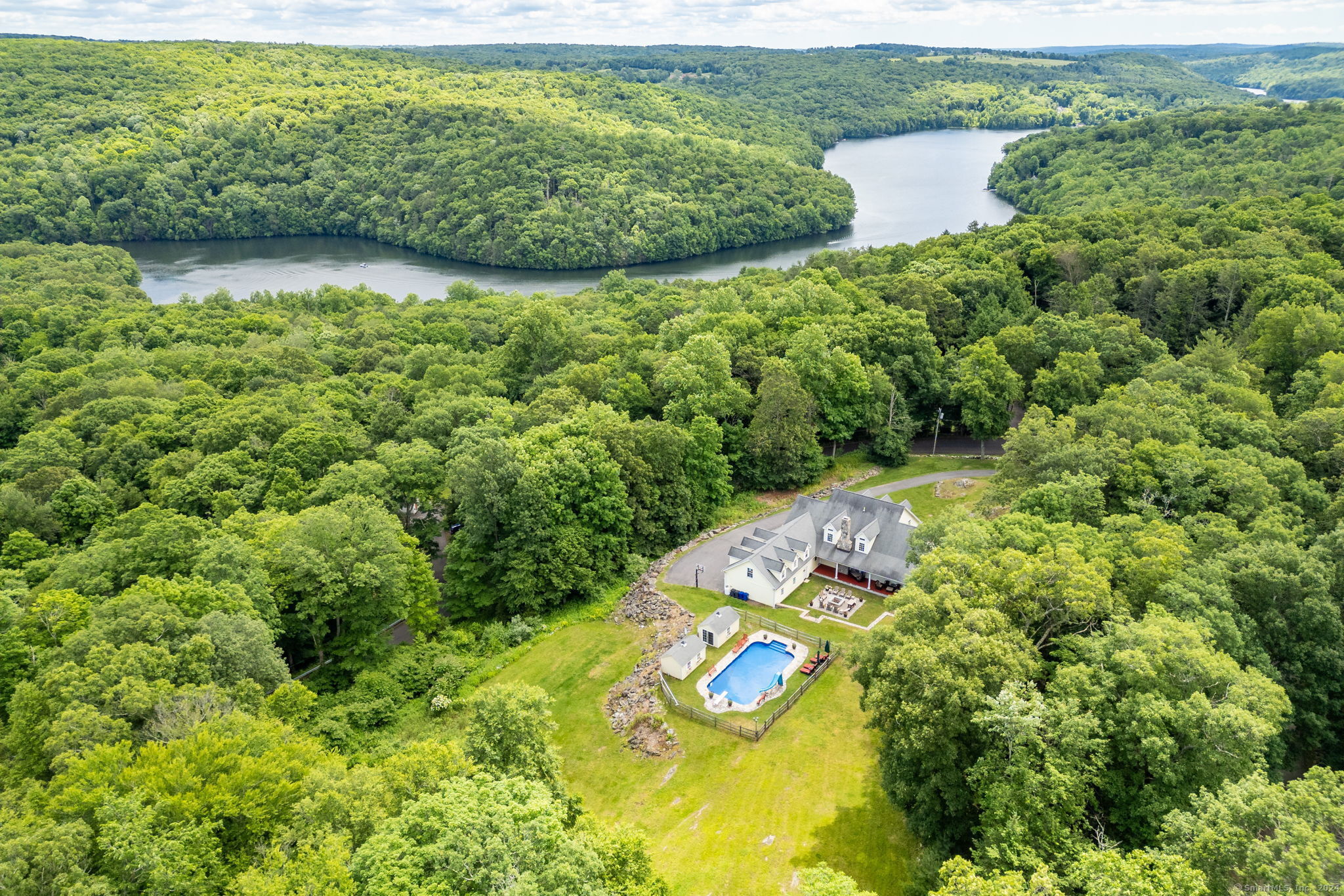 a view of a back yard with green space