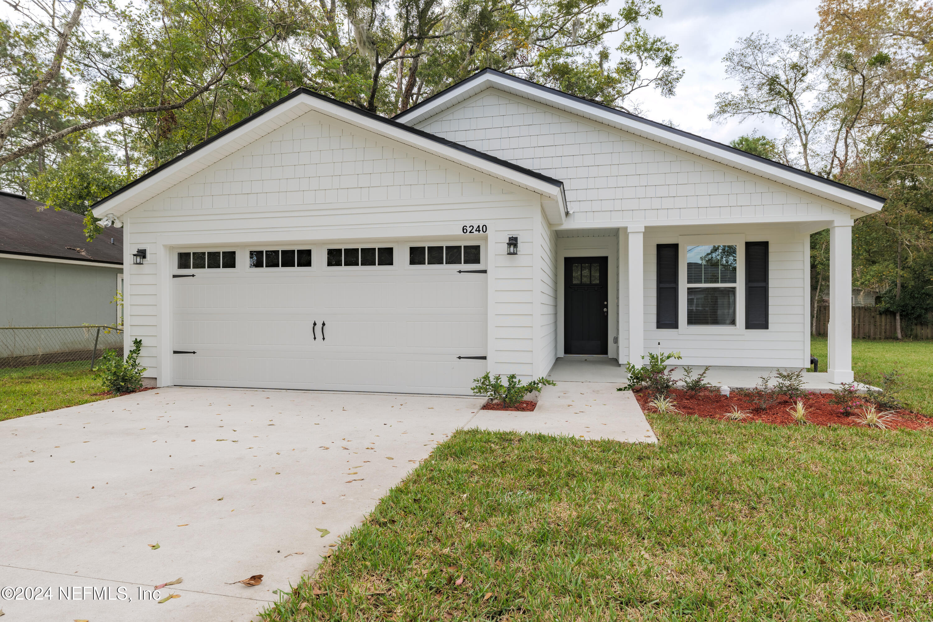 a front view of house with yard