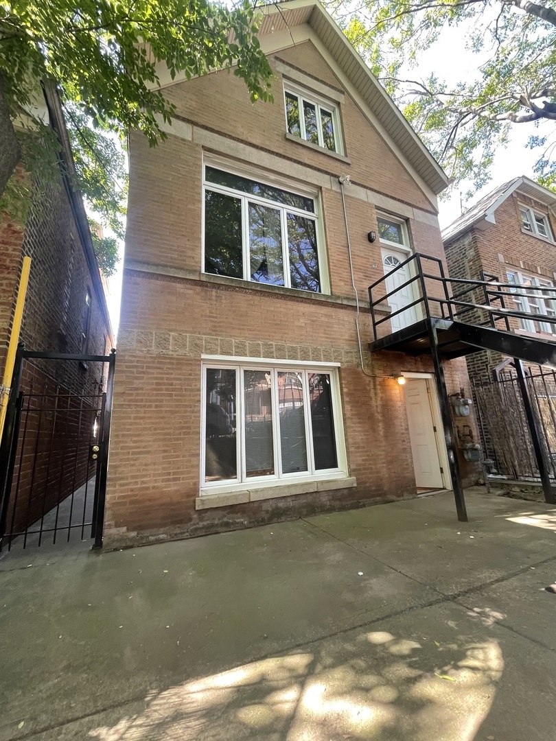 a front view of a house with garage