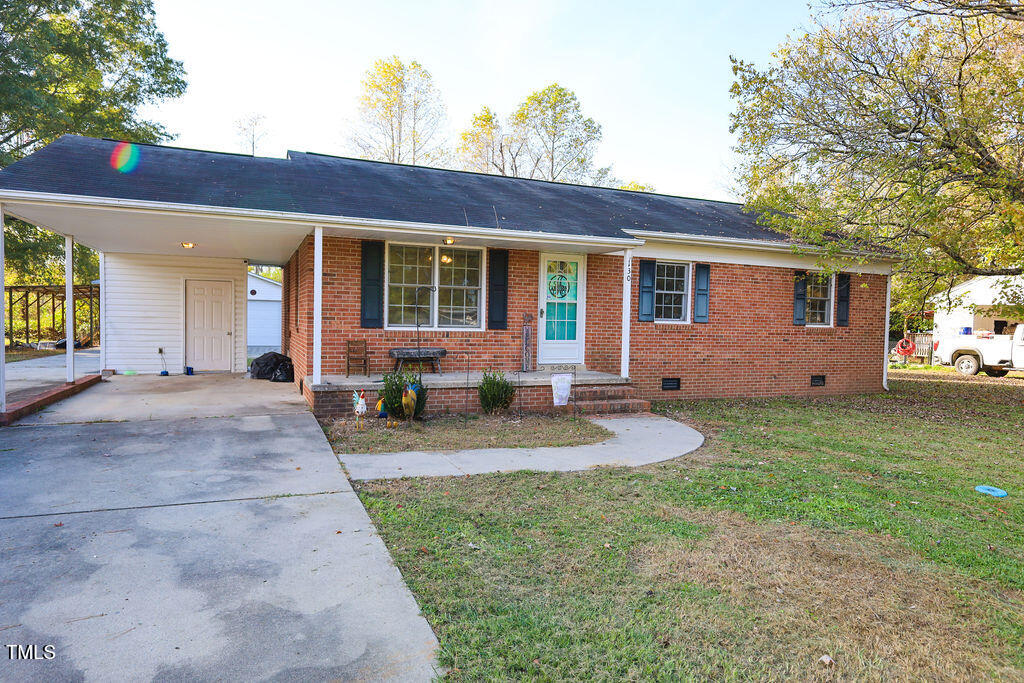 a view of a house with a patio