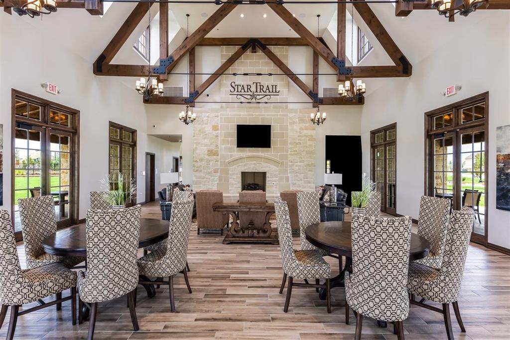 a view of a livingroom with furniture and a fireplace