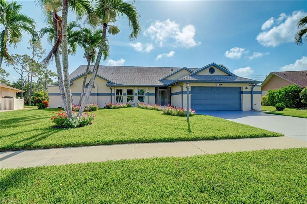 Recently painted single family home with two car garage on oversized lot