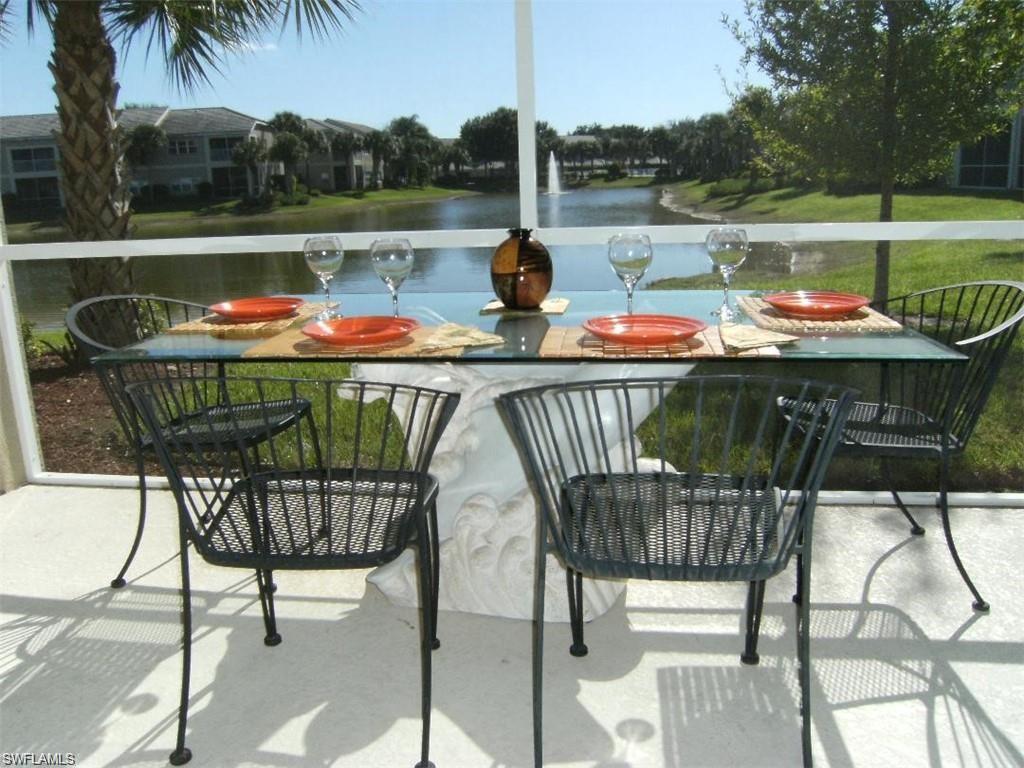 a view of deck with furniture and stove