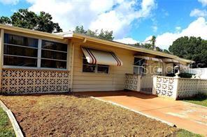 a front view of a house with a garage