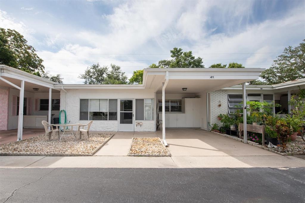 front view of a house with a patio