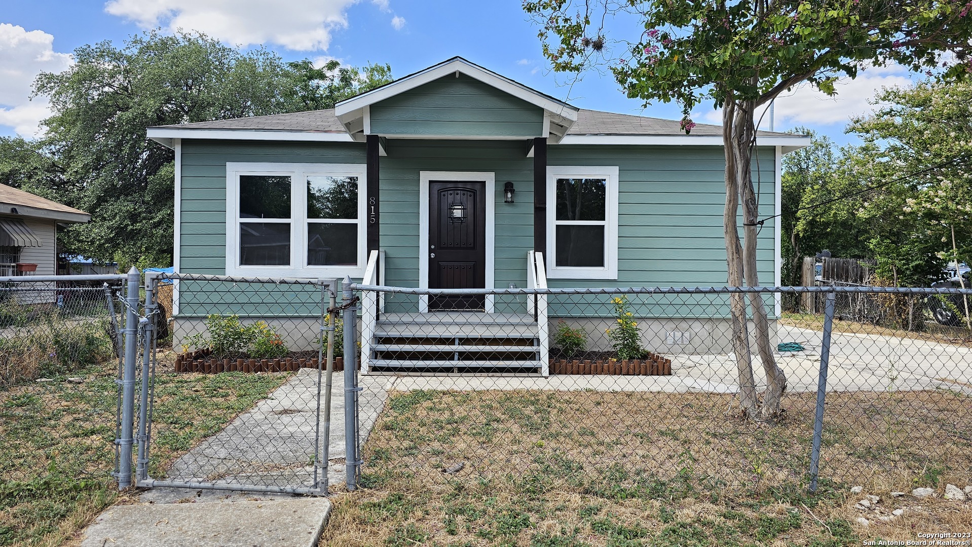 a front view of a house with a porch