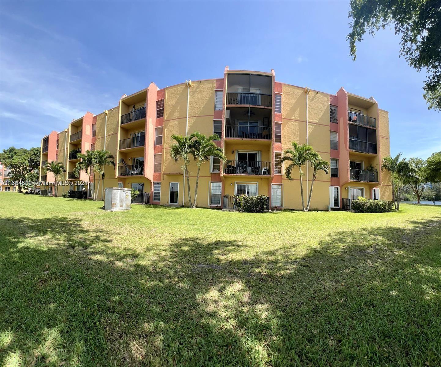 a view of building with yard