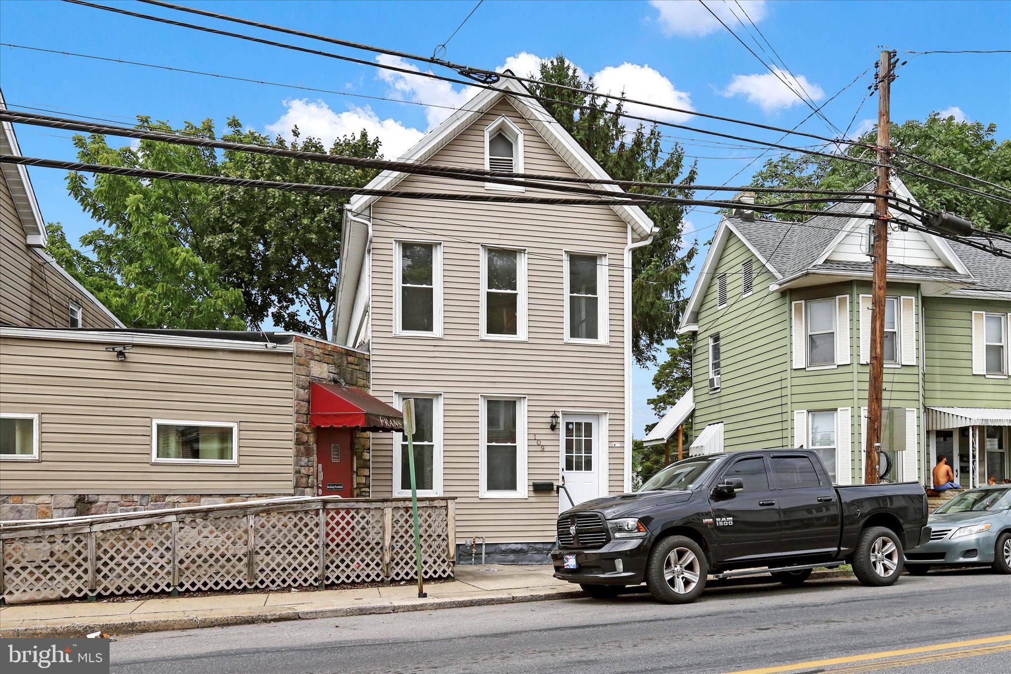 a car parked in front of a house