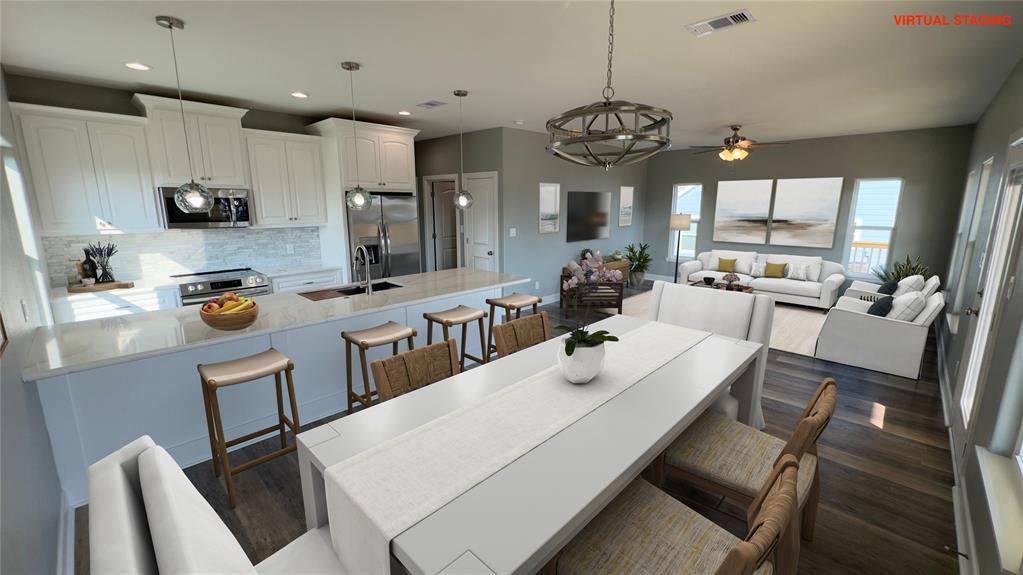 a large kitchen with a table and chairs